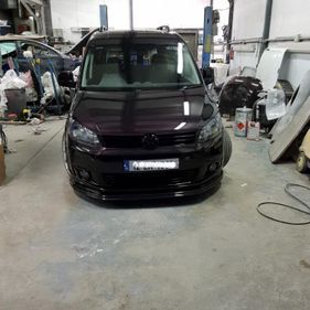 Front view of a resprayed black van