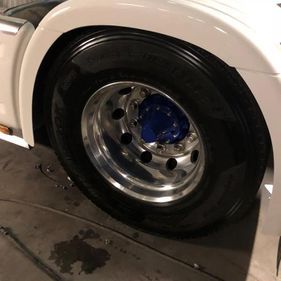 Resprayed white rims of a scania lorry