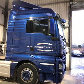 Resprayed blue lorry sideview